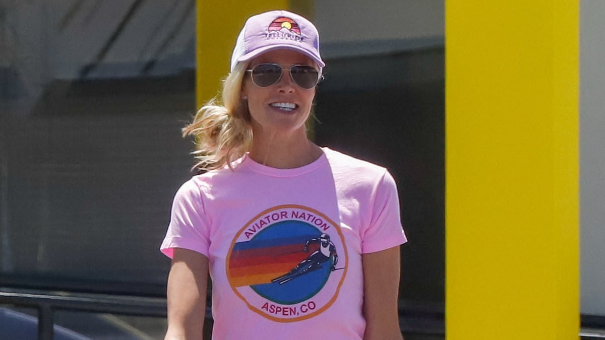 Julian McMahon's ex-wife Brooke Burns smiles in LA... days after his shock death