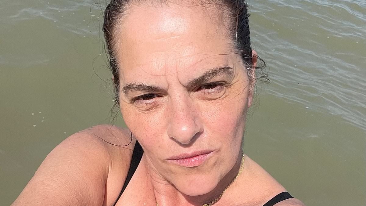 Tracey Emin shares powerful topless snap showing her stoma bag as she marks her 62nd birthday after extensive bladder cancer surgery