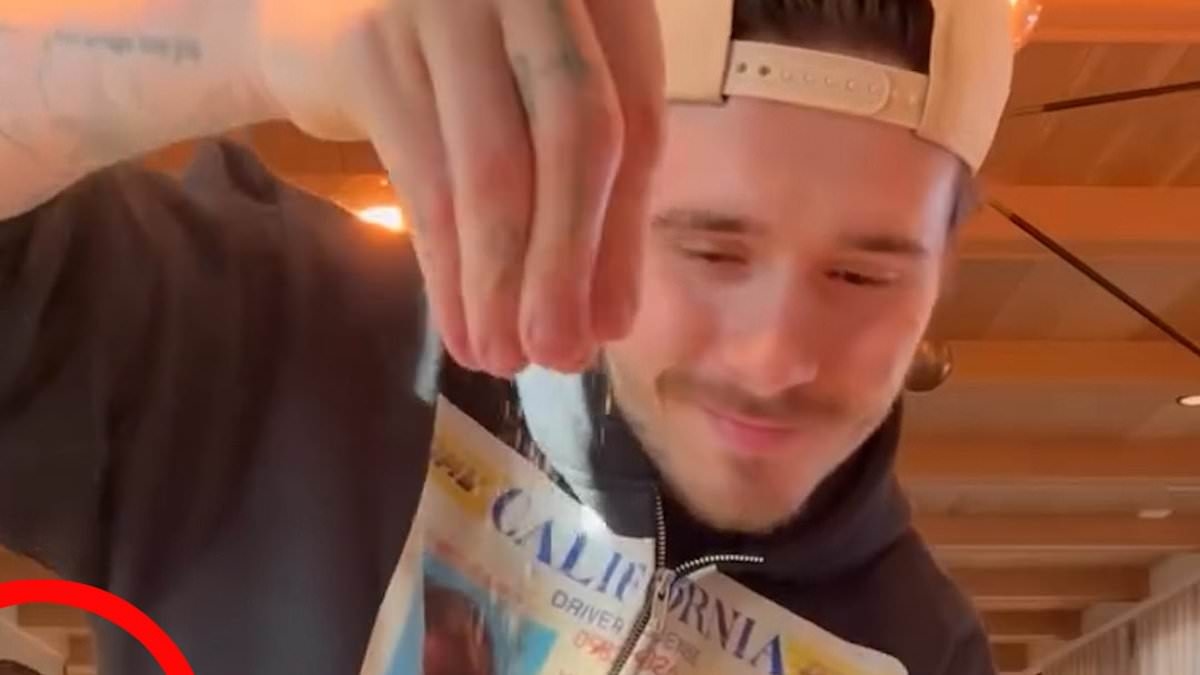 'Did anyone else notice!?' Aspiring chef Brooklyn Beckham is mocked as fans spot private cook in the back of his chicken wrap tutorial video