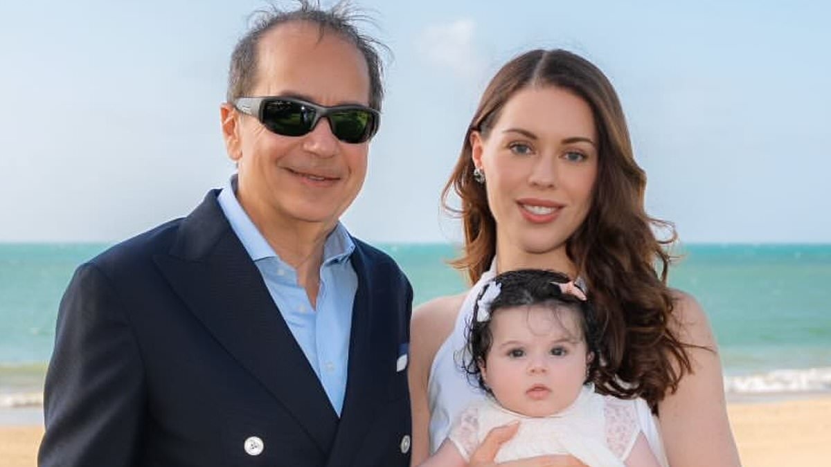 Billionaire poses with glamorous new fiancee and their BABY while scorned ex-wife holds him hostage in divorce court