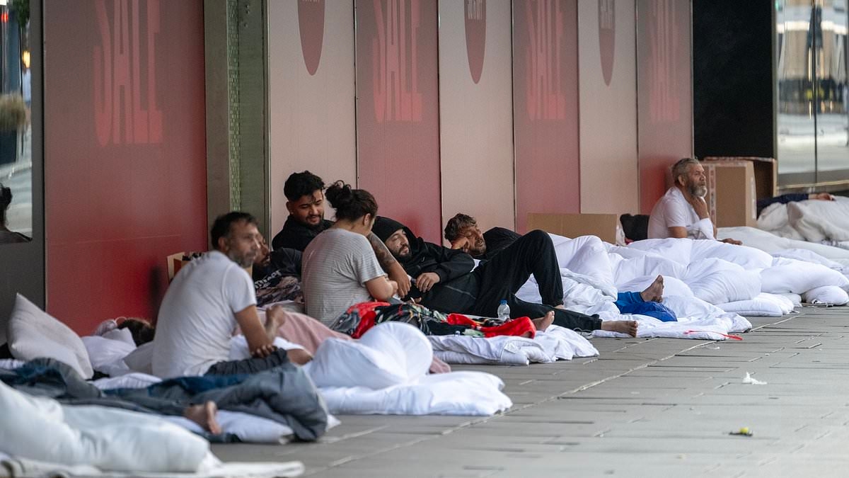 Rough sleepers outside Oxford Street's former John Lewis flagship after migrant 'shanty town' cleared out