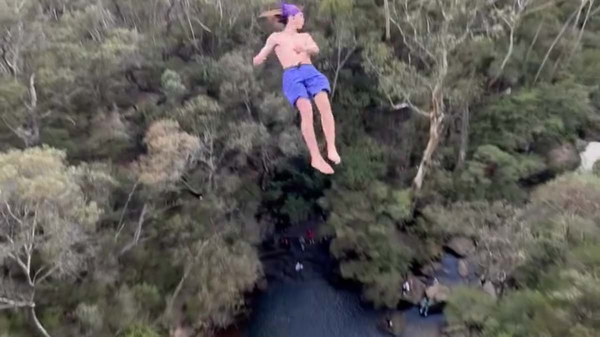 Aussie's hair-raising world record 'death dive' attempt from the top of 42metre sheer cliff goes horribly wrong