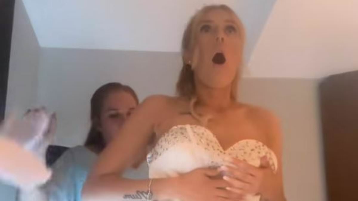 Bride breaks down in tears after wedding dress rips just moments before she walks down the aisle