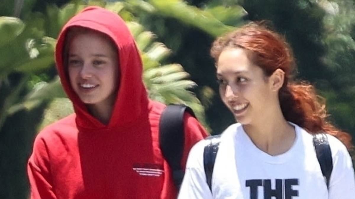 Angelina Jolie's mini-me Shiloh proves she's no fashion snob as she recycles old $50 hoodie when out with gal pal