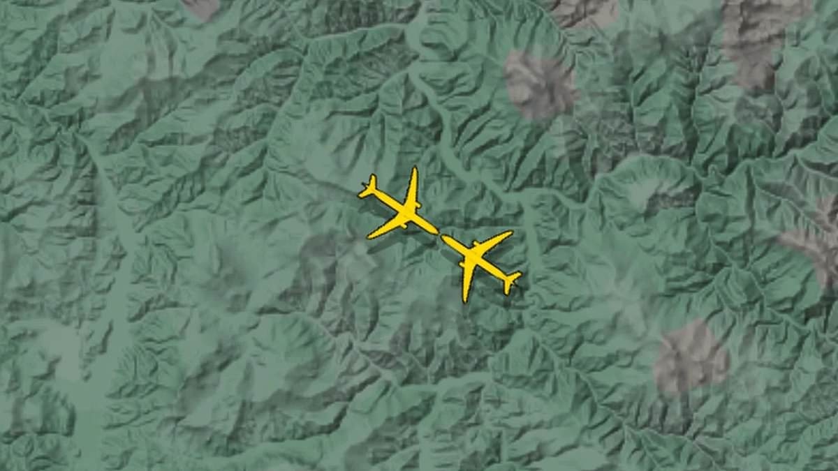 Passenger jet and cargo plane miss each other by just 300ft over Russia after 'unexpected manoeuvre' by Air China flight puts it on collision course