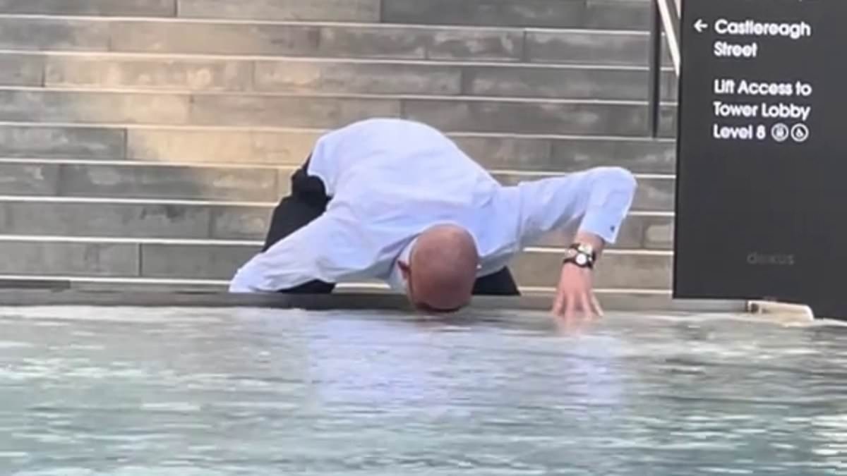 Worker's bizarre act at a water feature baffles Aussies - but there's a very simple explanation