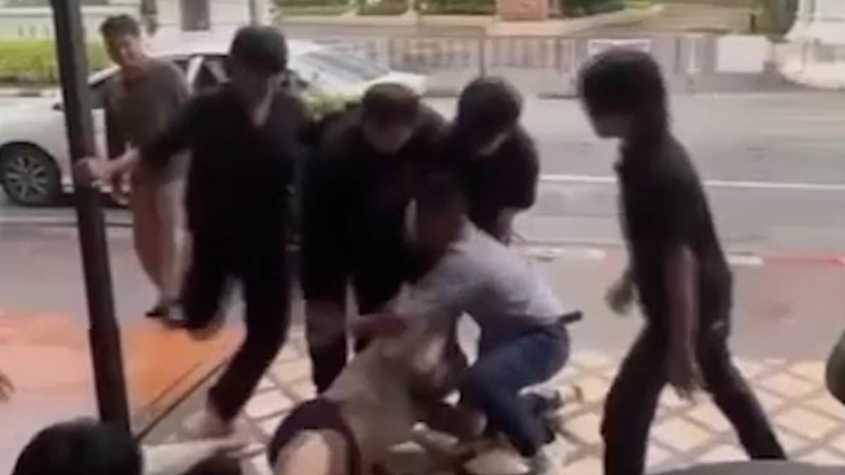 Shocking moment Brit 'given rip-off £460 drinks bill' pleads with attackers to stop as Thai bar workers pin him down and kick him when he refuses to pay