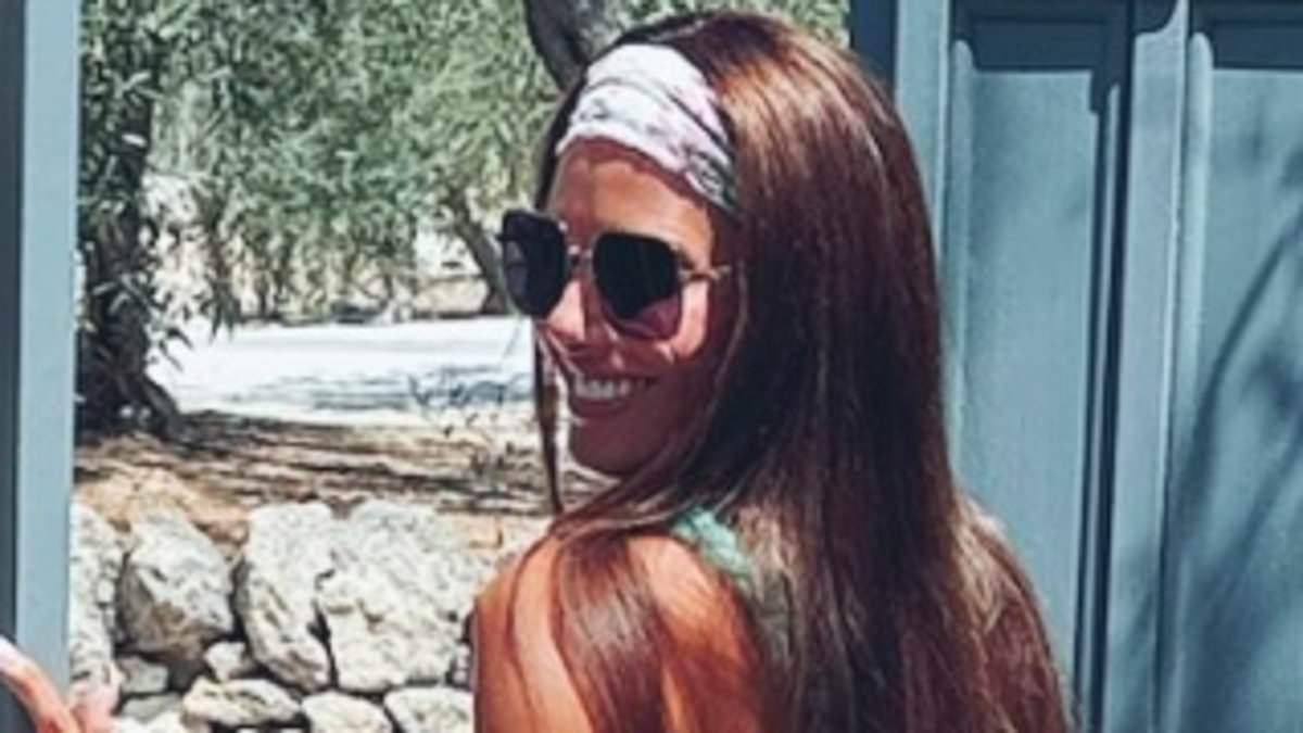 Rebekah Vardy flaunts her washboard abs in a skimpy bikini on Portugal trip with footballer husband Jamie