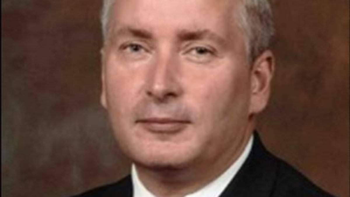 Family still don't have permanent home after ex-counter terror chief blew himself up in 2,000C fireball because wife was leaving him, inquest hears