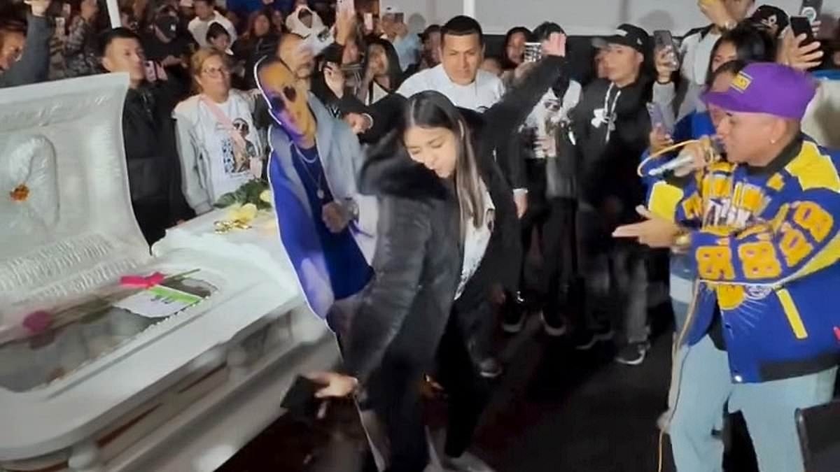 Outrageous moment widow TWERKS against her late husband's open coffin during his funeral