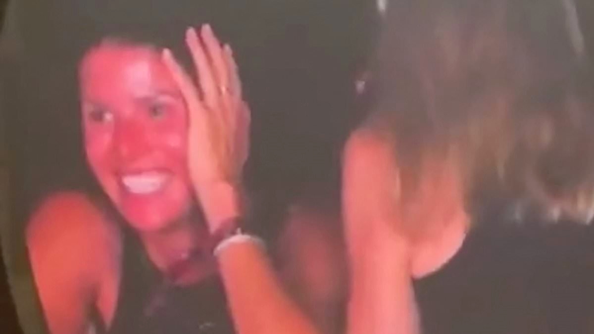 Intriguing identity of brunette woman caught on camera next to cuddling CEO and HR boss at Coldplay concert