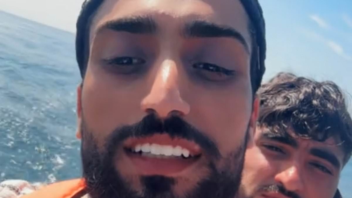 EXCLUSIVE Grinning small boat migrant chronicles his journey across the Channel to the UK - as he films himself celebrating on Blackpool beach after illegally crossing into Britain