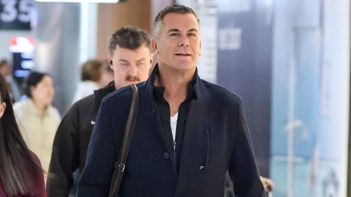 Wayne Carey appears unbothered as he's seen for the first time since THAT bathroom video went viral on whirlwind trip to Sydney - after the woman in the controversial clip went public