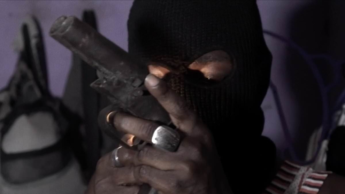 Violent cult that became the world's most feared mafia: The Black Axe gang tortures new recruits in a naked blood-drinking initiation - now British teens are targeted on social media to help launder £3.8 billion a year