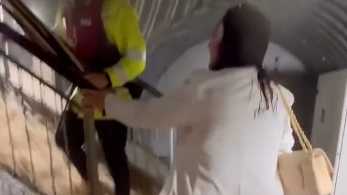 Moment tourists flee for their lives as cave floods in torrential downpour - as Met Office warns half a month's rain could fall in just one hour in parts of Britain