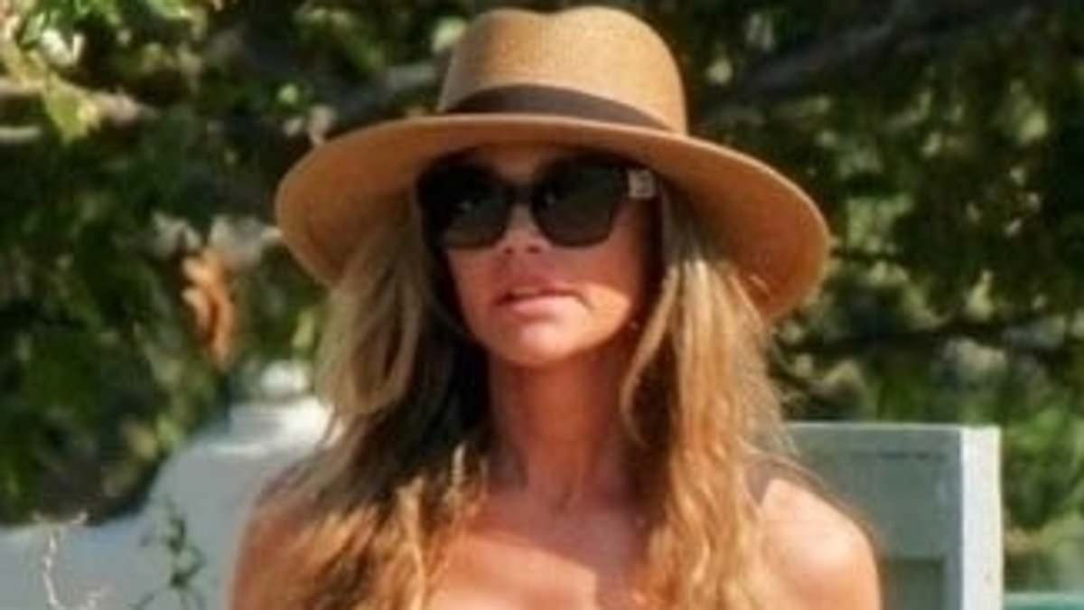 Denise Richards seen without wedding ring as she steps out in LA after ex Aaron Phypers accused her of affair