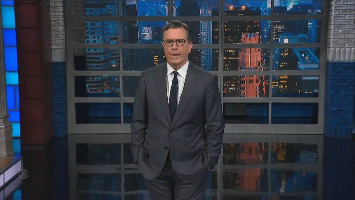 Stephen Colbert declares himself a 'martyr' and warns the 'gloves are off' in searing response to Trump