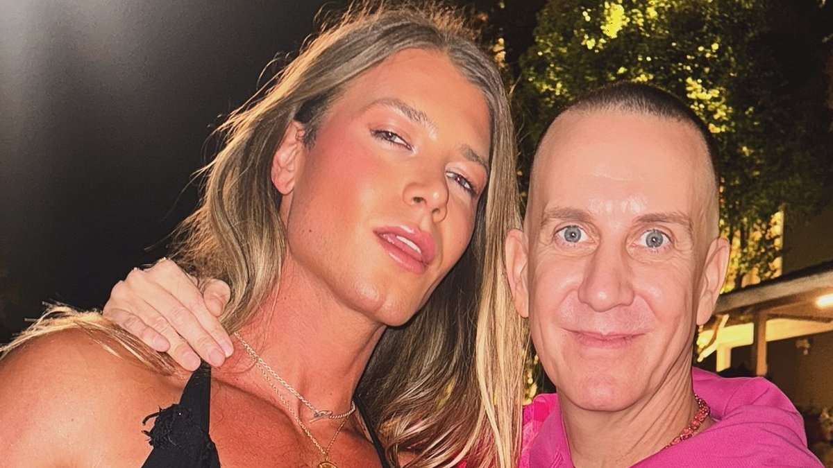 Christian Wilkins looks unrecognisable as he gets cosy with A-list fashion designer at glamorous party in the US