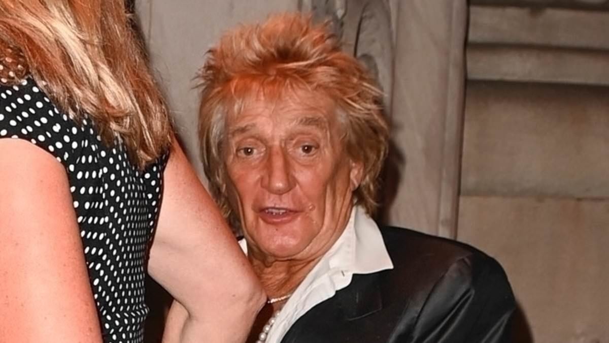 Rod Stewart, 80, wears a quirky satin blazer as he joins his leggy wife Penny Lancaster, 54, in New York City