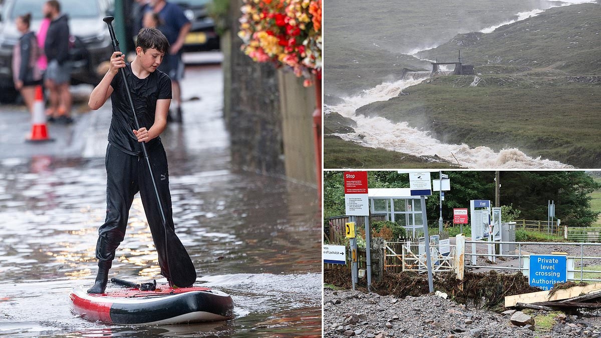 Flash flooding and downpours bring chaos to roads and railways across Scotland