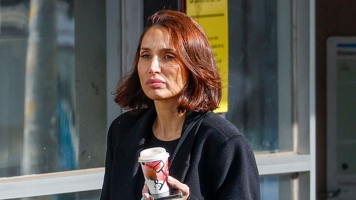Snezana Wood shows off her new red hair as she enjoys day out with her four-year-old in Melbourne - after teen daughter Eve broke down in viral video about her biological dad