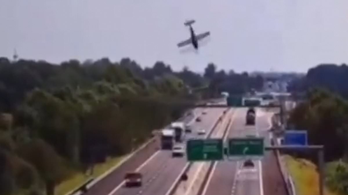 Horrifying moment plane nosedives and crashes into a motorway with cars driving through fireball aftermath in Italy