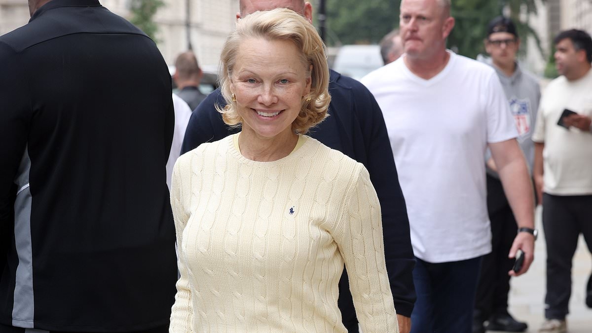 Pamela Anderson is all smiles as she leaves London's Corinthia Hotel with Liam Neeson after their true feelings about each other were 'revealed'
