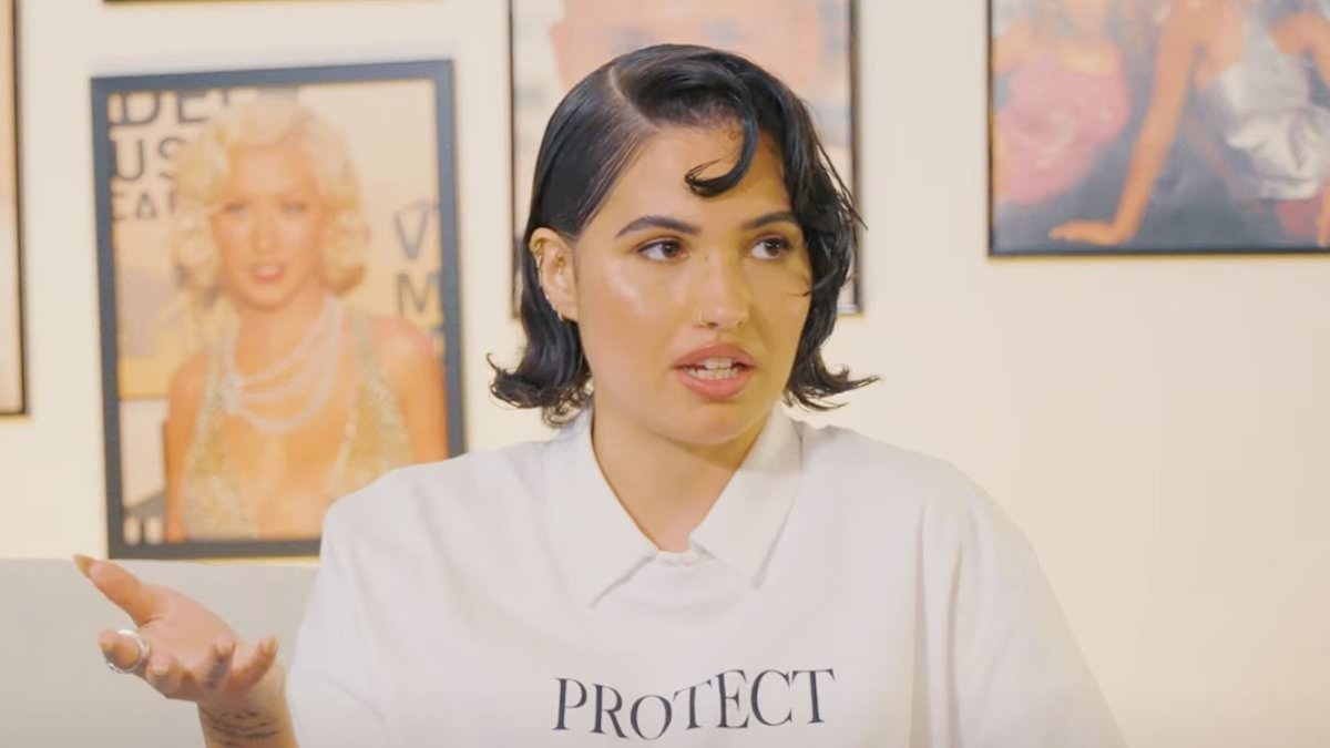 Mabel, 29, hits back at nepo baby claims as she admits 'I work hard every day' in candid interview about growing up with her famous parents