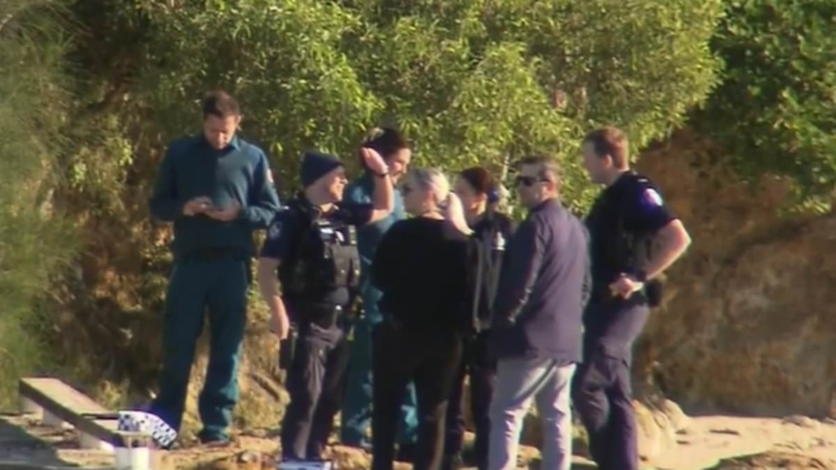 Harrowing scenes as woman's body is found floating down Currumbin Creek on the Gold Coast - as police probe her mysterious death