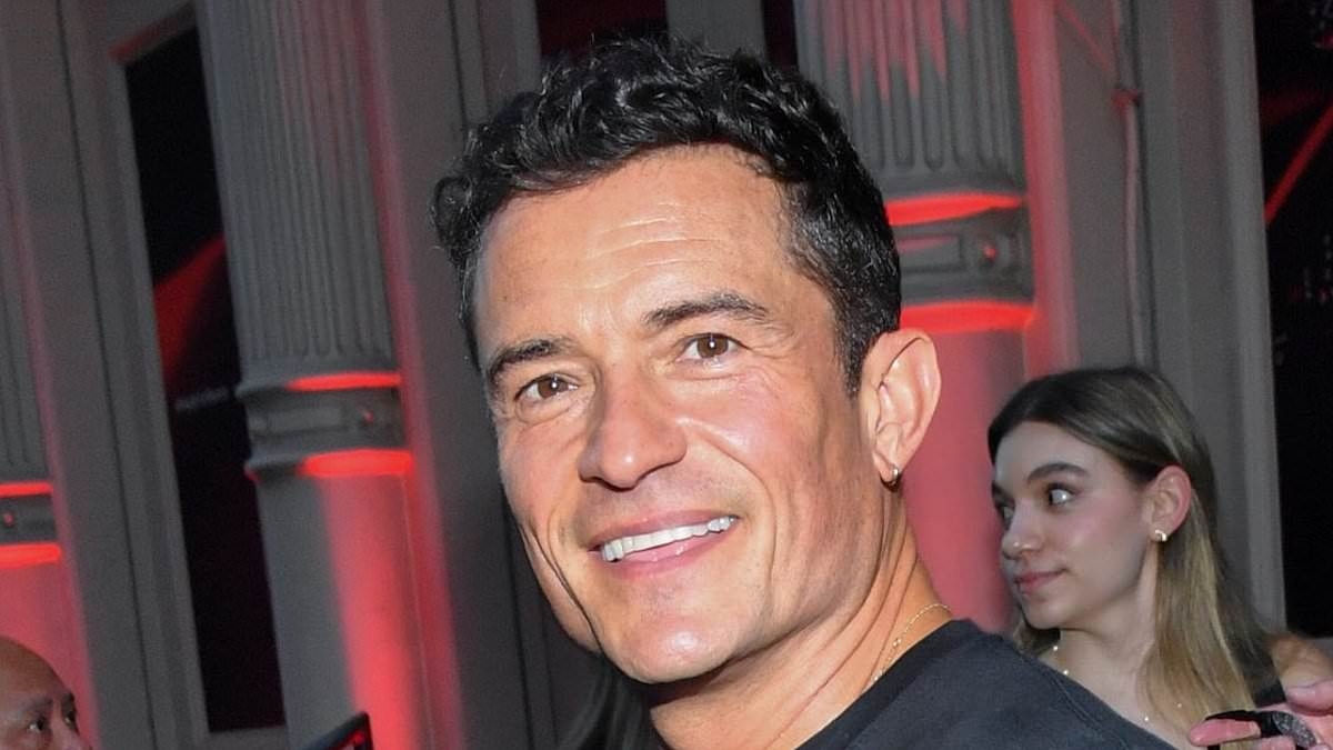 Newly single Orlando Bloom beams at glitzy event after ex Katy Perry nearly teared up on stage amid split