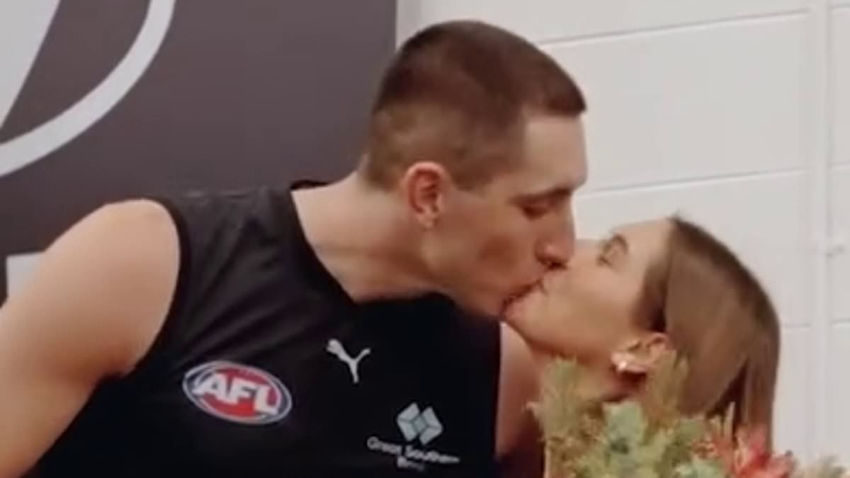 AFL star Jacob Weitering surprises teammates with shock baby announcement with wife Isabel