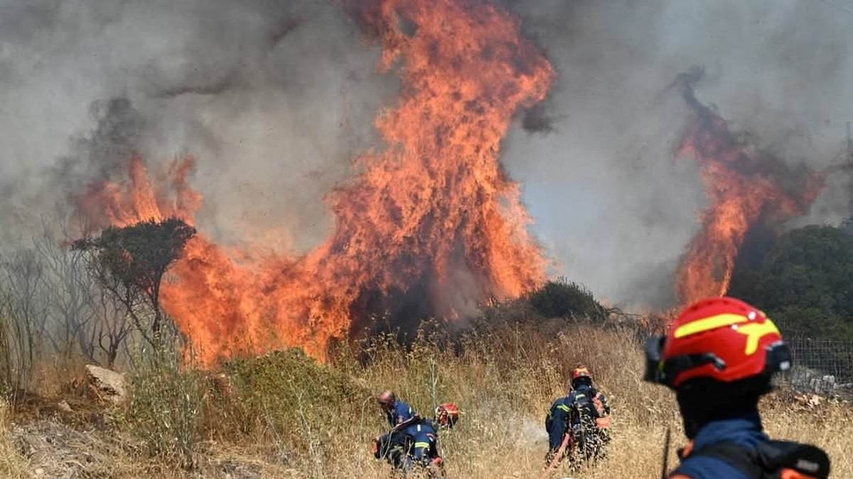 Wildfires burn through the night in Eastern Europe as over 50 blazes in Greece alone sees families evacuated from their homes
