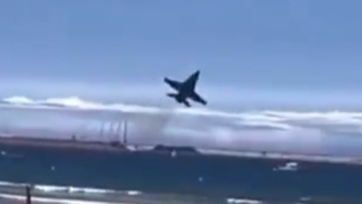 Tourists terrified as fighter jet performs ultra-low pass over beach during Spanish air show