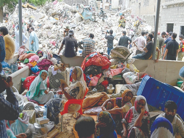 Hope fades as Lyari building collapse toll hits 23