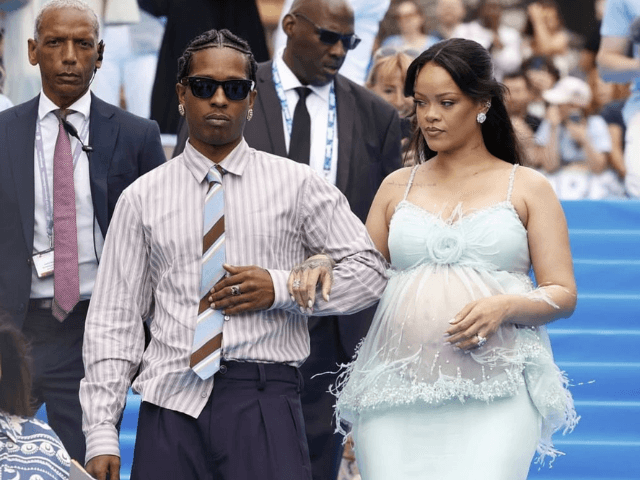 Rihanna debuts baby bump in custom Chanel at 'Smurfs' premiere in Brussels