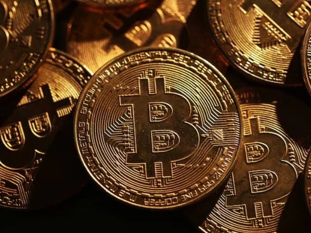 Bitcoin hits record high above $122,000 as investors eye crypto legislation
