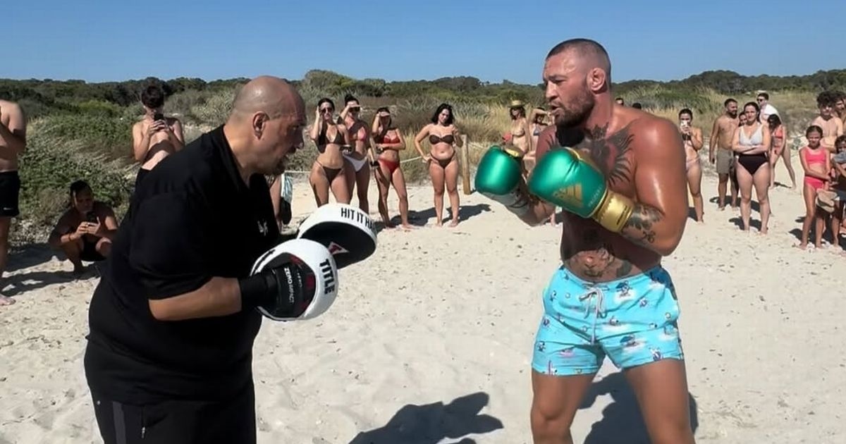 Conor McGregor draws huge crowd at the beach as UFC star is filmed training in the sun
