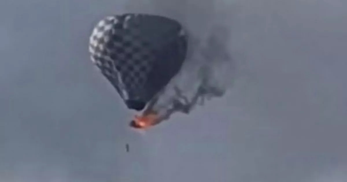 Man falls to his death from flaming hot air balloon in horrifying video