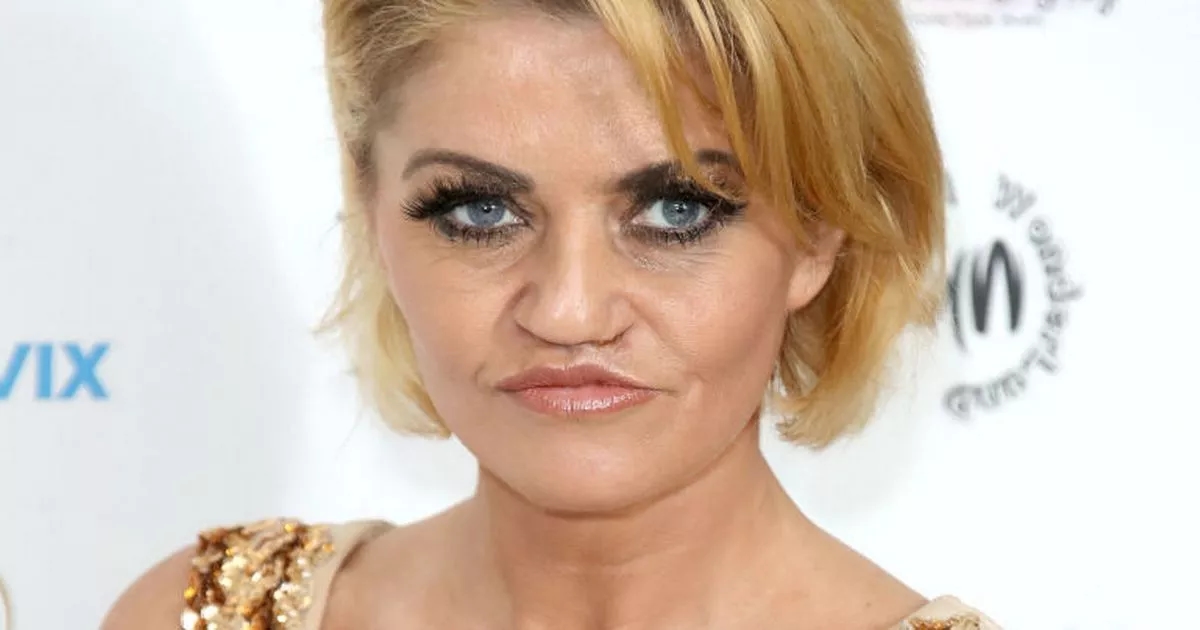 Danniella Westbrook pictured in hospital bed before face-rebuilding surgery