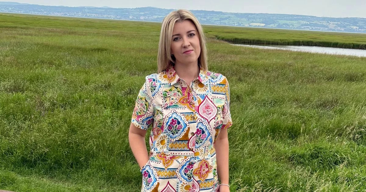 'I'll be wearing this pretty postcard print jumpsuit all summer'