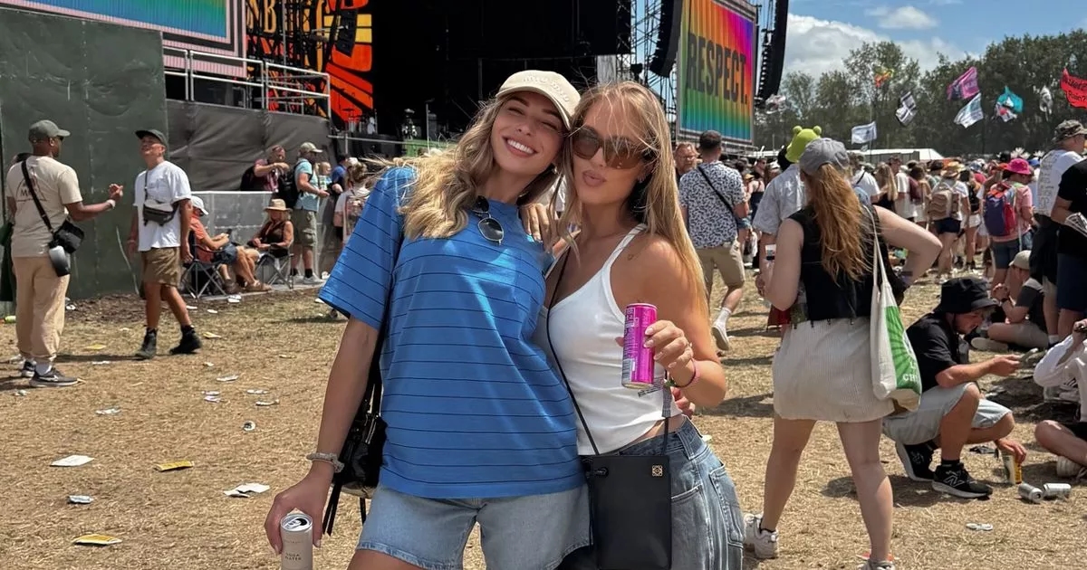 Zara McDermott poses with Louis Tomlinson's sister at Glastonbury Festival