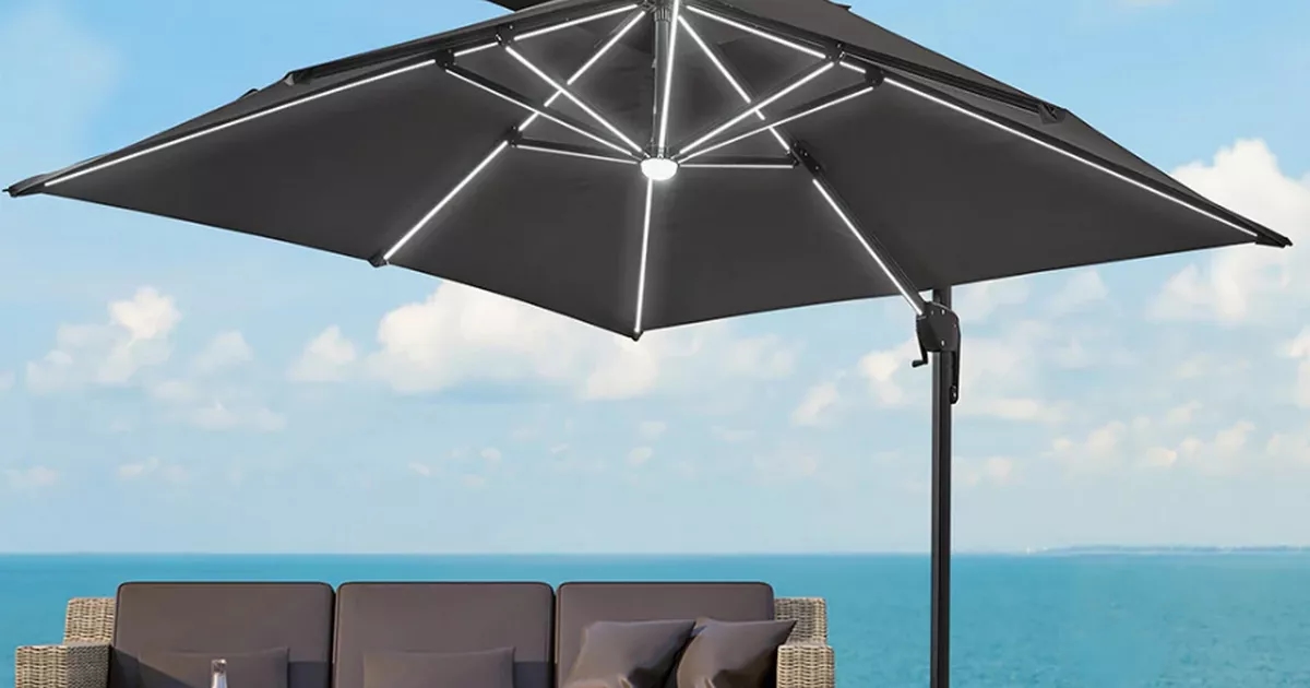 Large garden parasol with LED solar lights reduced by £85