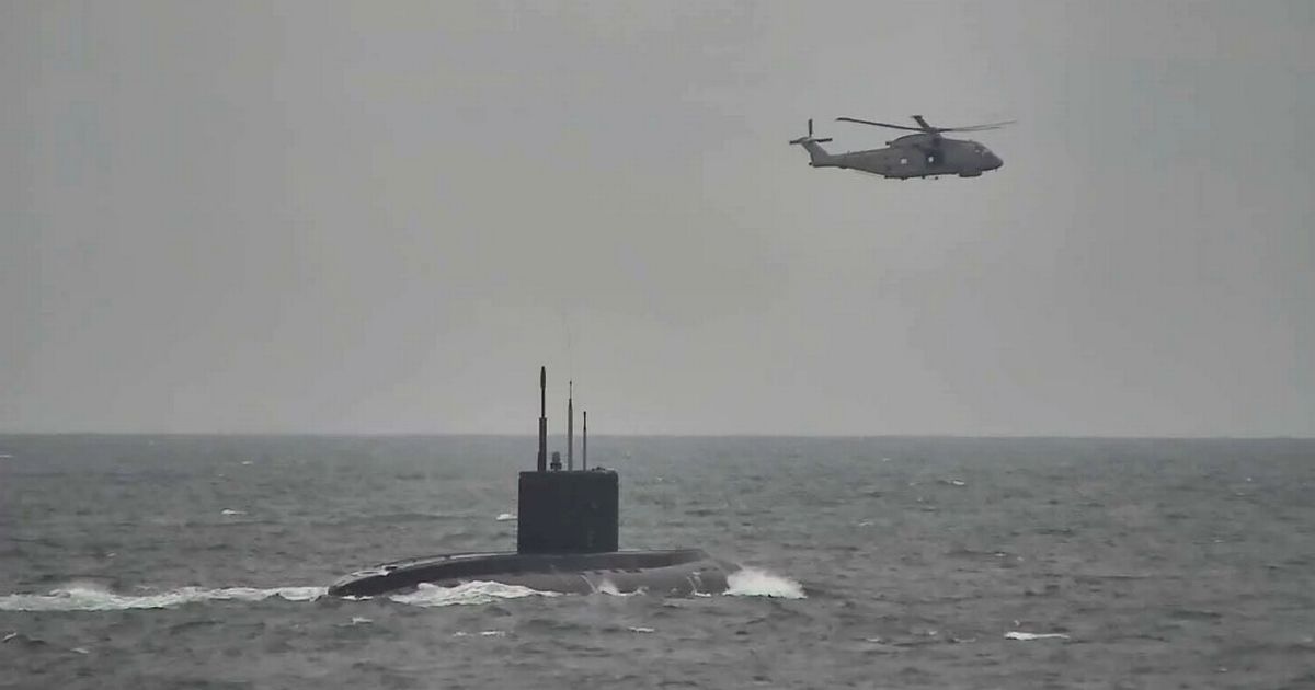 Russian submarine off UK coast tracked by Royal Navy warship and helicopters
