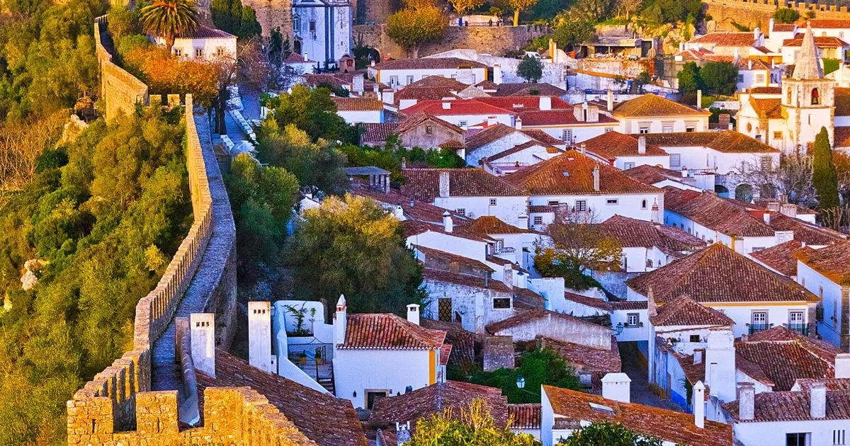 Town branded 'Santorini of Portugal' has £2 beer and 'postcard-perfect' streets