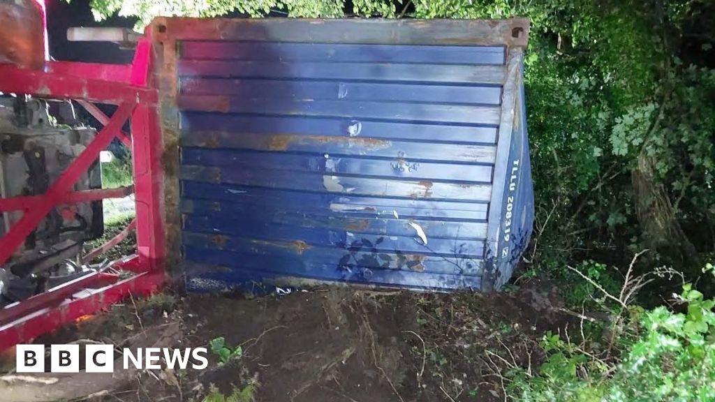 Toppled Wareham lorry container recovery to close road