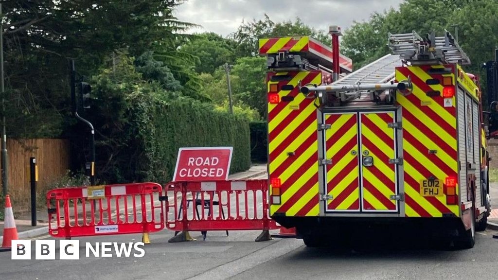 Ten lorries on fire at waste site in College Road, Epsom