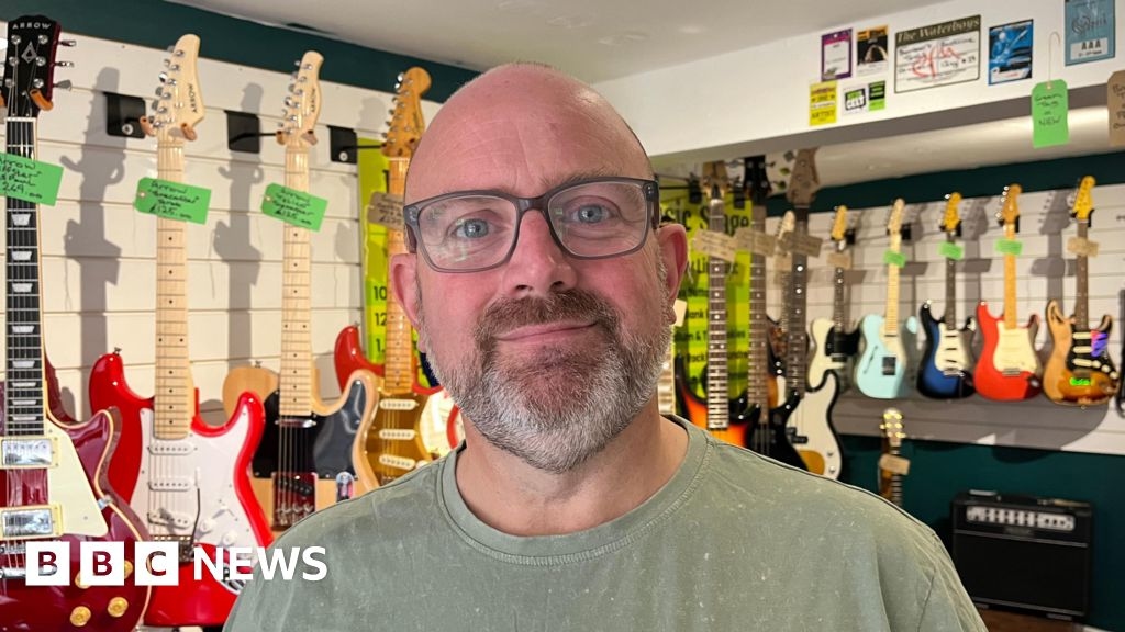 Shropshire's Alex Harris leaves roadie life to open music shop