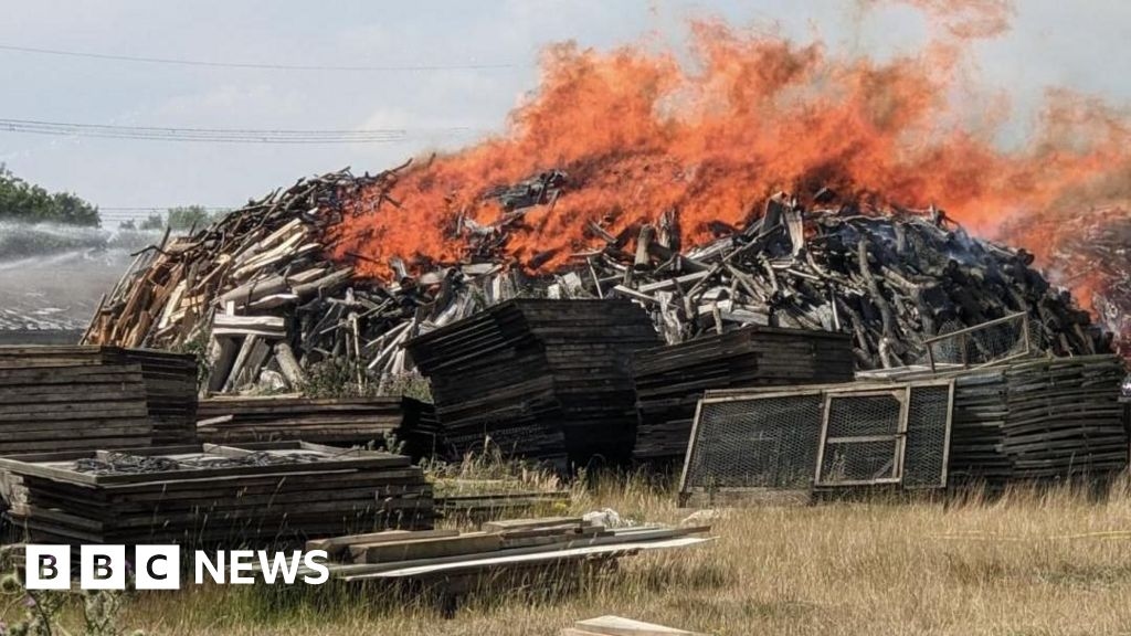 Bradwell wood pile fire 'challenging' for crews, manager says
