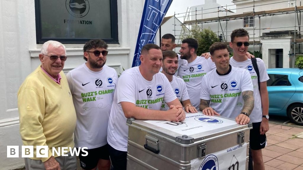 Brighton & Hove Albion kit team completes 35-mile charity walk
