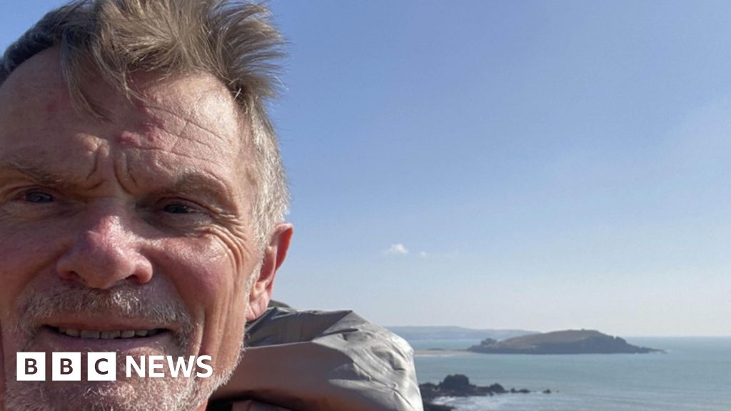 Retired banker from Devon in running challenge hits halfway point